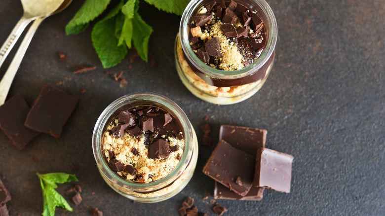 jars of layered chocolate dessert
