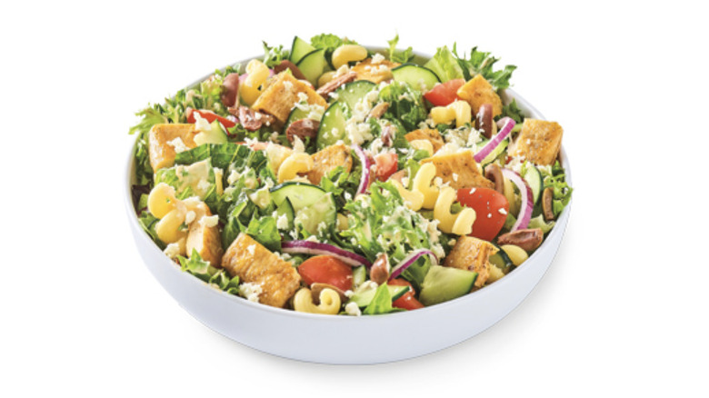 salad with cucumbers, noodles, and chicken