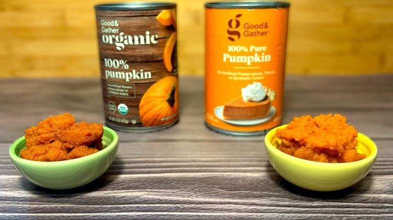 Photo of two cans of Good & Gather 100% pure pumpkin purée, one organic and one not, with examples of the pumpkin in small bowls before them