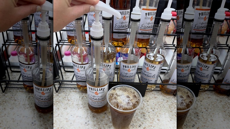 Phillips syrups on a counter with an iced coffee