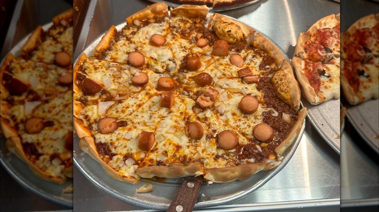 Pizza with hot dogs