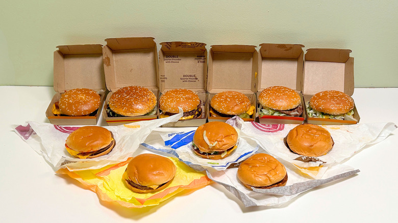 Several McDonald's burgers lined up together in multiple rows.