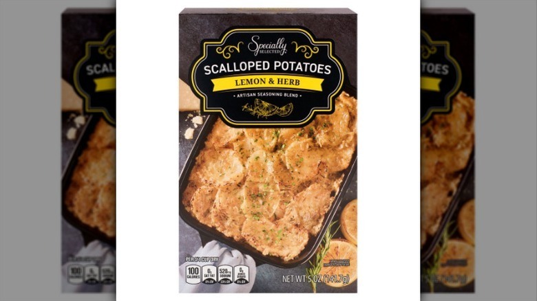 Box of lemon herb scalloped potatoes on white background