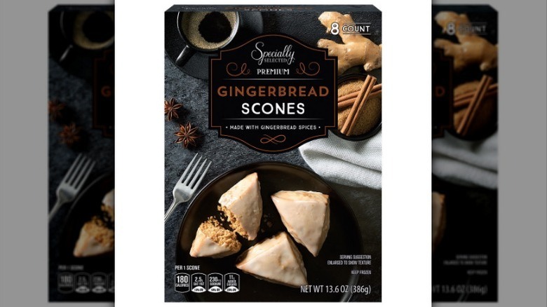 Box of gingerbread scones on white background