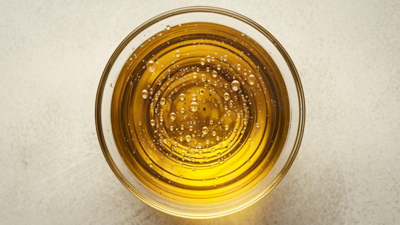 Overhead view of cooking oil in bowl