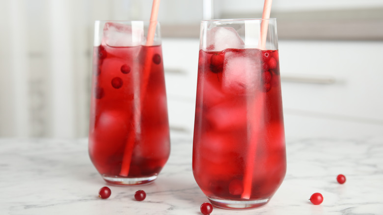 Red cranberry cocktails tall glasses straws