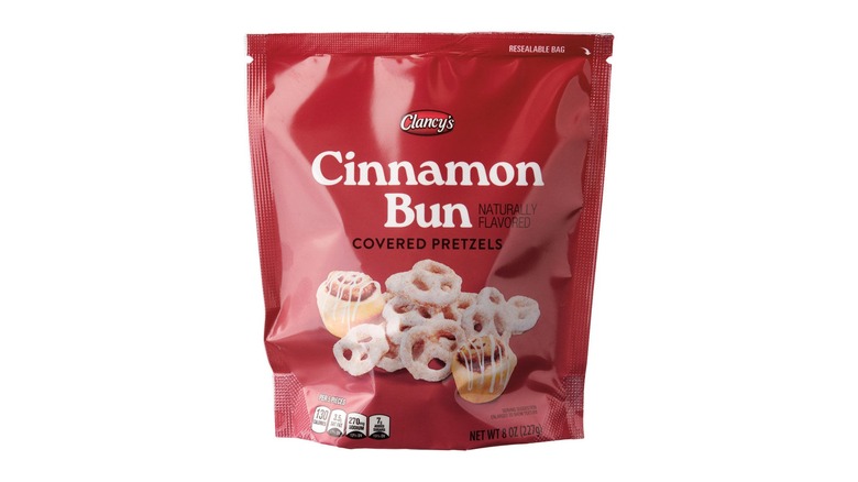 Bag of cinnamon bun pretzels on white background