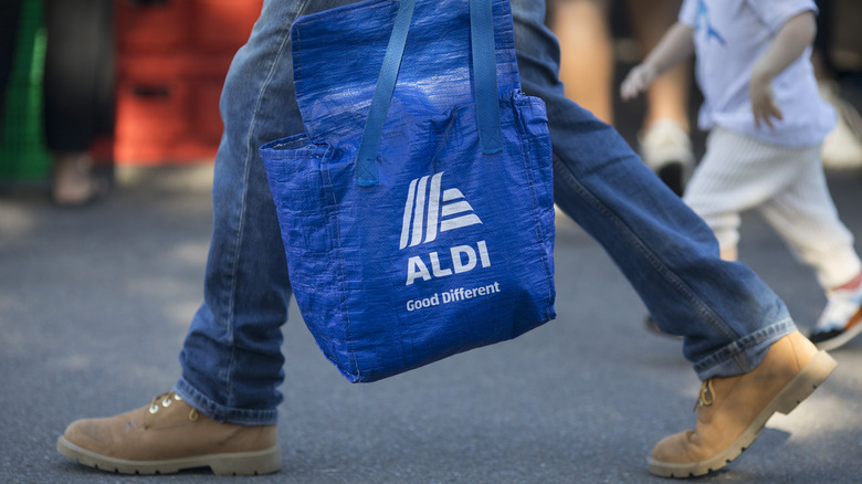 Walking with Aldi bag