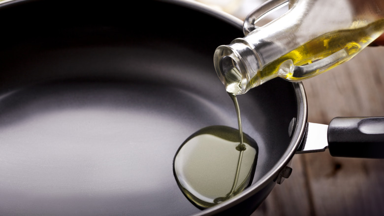 Pouring oil in nonstick pan