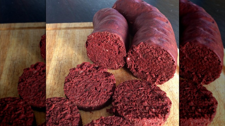 Sliced light red blood sausage