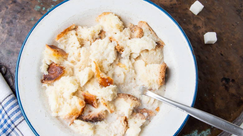 A bowl of pudding made with bread and milk