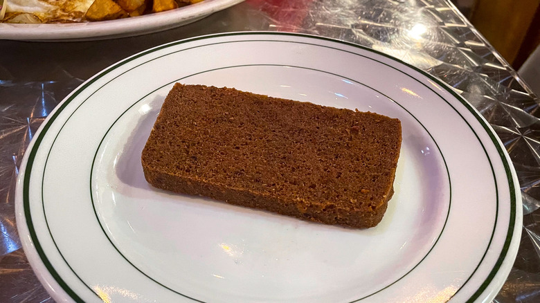 A piece of scrapple on a plate