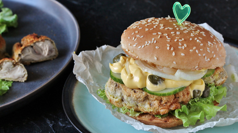 A fried brain burger on a plate