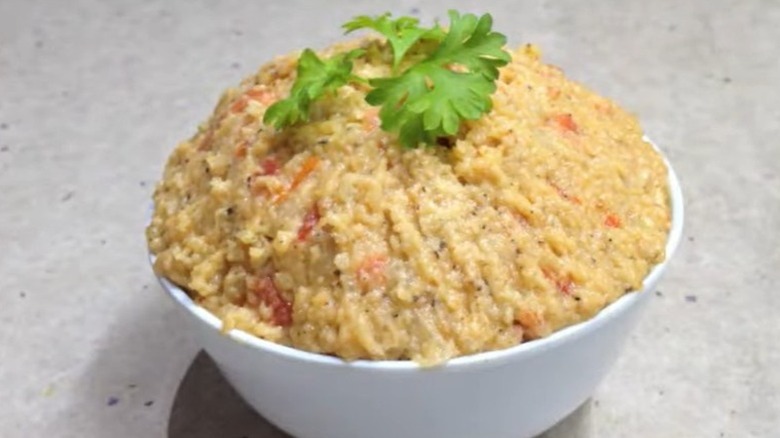 A white bowl full of mock chicken