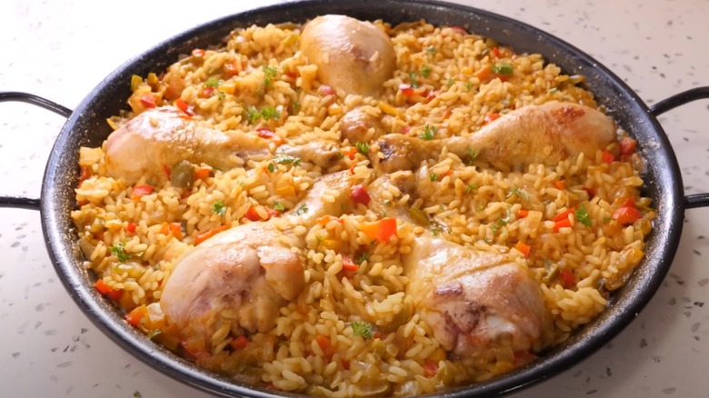 Arroz con pollo in cast iron pan