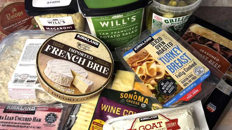 Variety of Costco deli products laid out on a table.