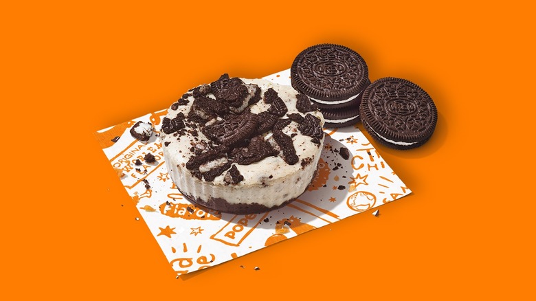 Popeyes' Oreo Cheesecake with orange background