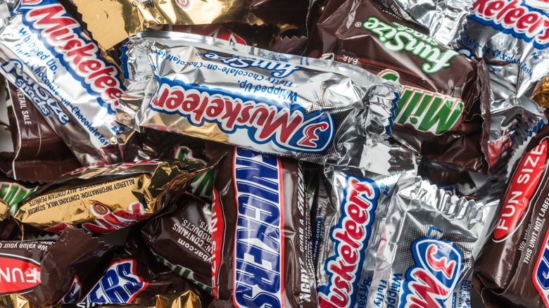 An assortment of Snickers, Three Musketeers, and Milky Way bars