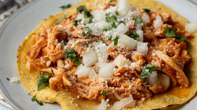 chicken tinga tostada on plate
