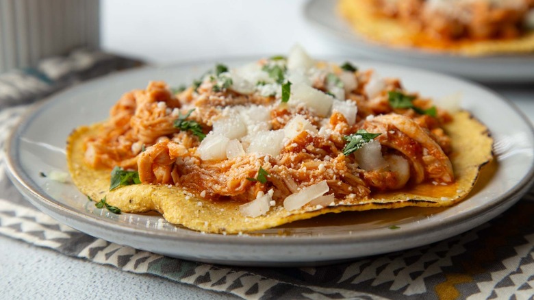 chicken tinga tostada on plate