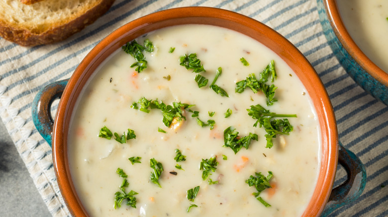 Clam chowder sprinkled with parsley