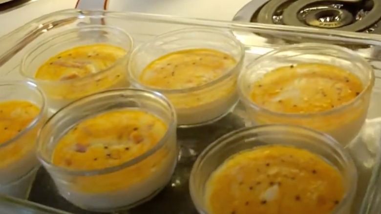 Egg timbales prepared in glass ramekins