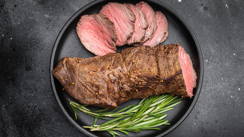 Roast beef tenderloin, medium rare with rosemary