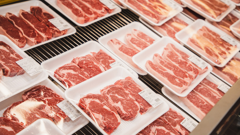 Packages of meat at a grocery store