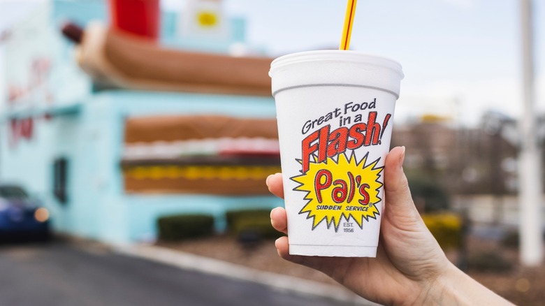 Pal's signature cup in hand