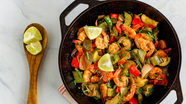 Shrimp stir fry in wok