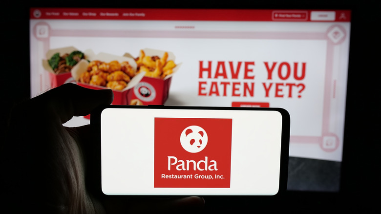 Panda Restaurant Group logo on phone screen