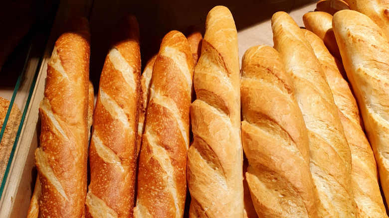 Baguettes on a black background