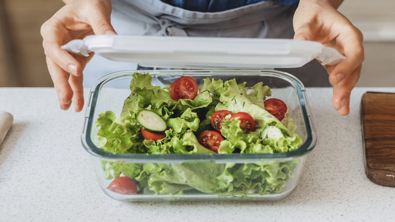 Salad in a plastic storage container