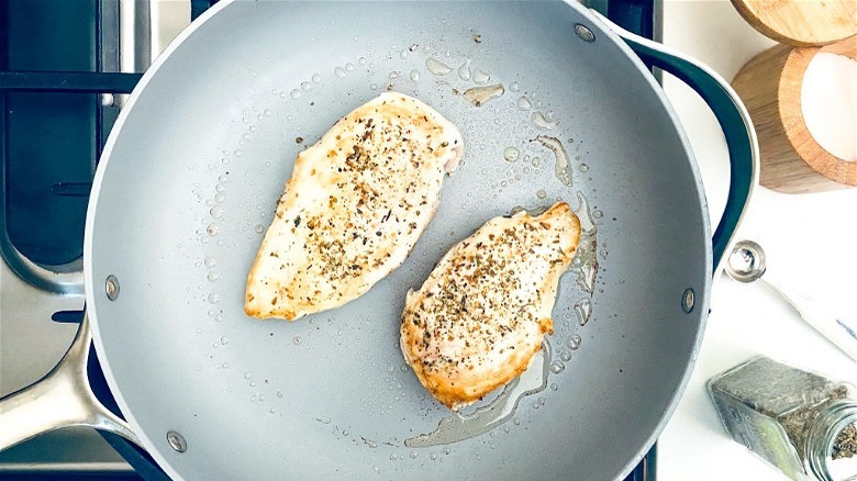 searing chicken breast in skillet