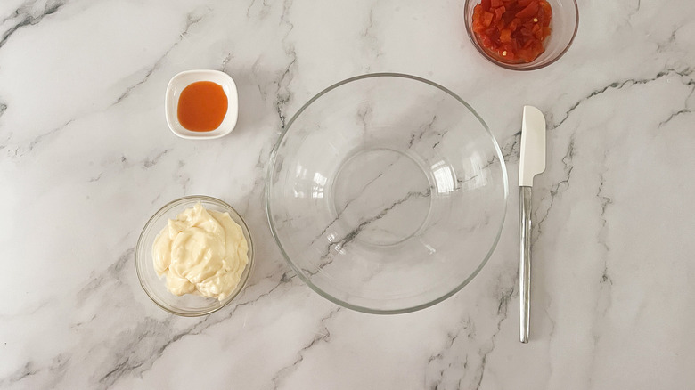 mayo and hot sauce in dish 
