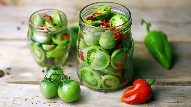 Jar of green tomatoes