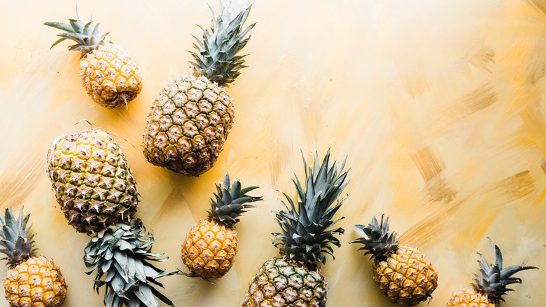 Pineapples on a yellow background