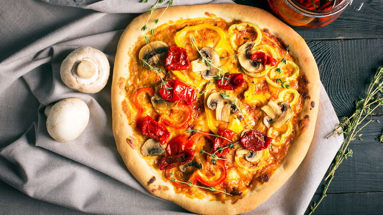Vegan curry pizza on a tablecloth