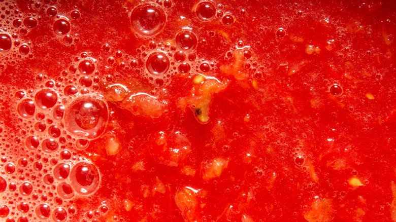 bubbling tomato sauce close up