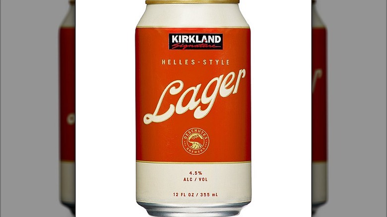 a can of Kirkland Signature Helles-Style Lager with orange and off-white branding