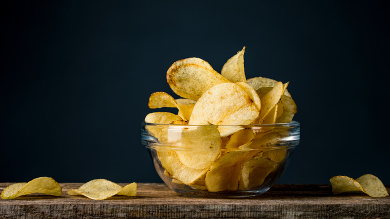 Potato chips in a glass bowl