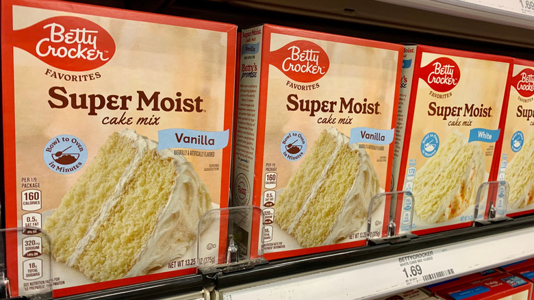 Boxes of Betty Crocker Super Moist cake mix on a supermarket shelf