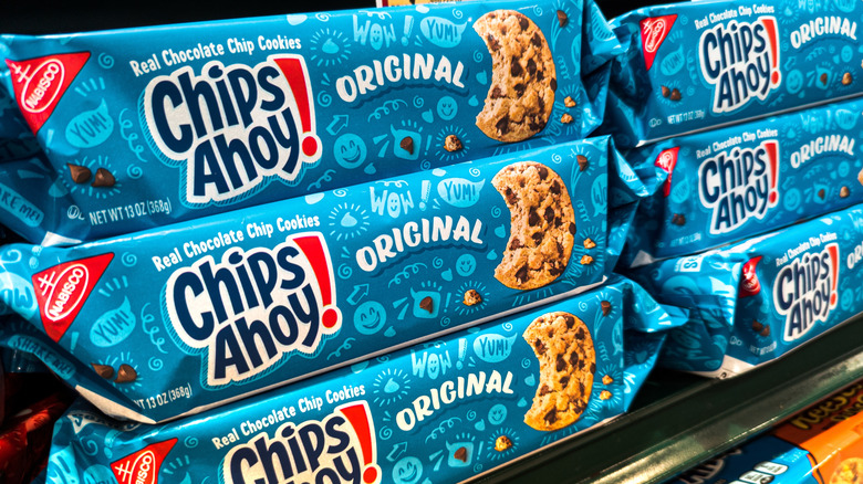 Chips Ahoy! Cookie packages stacked up on a supermarket shelf