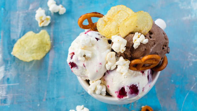 Ice cream with chips, pretzels, and popcorn