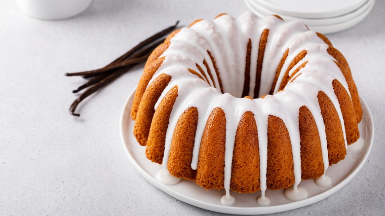 bundt cake with white powdered sugar icing glaze