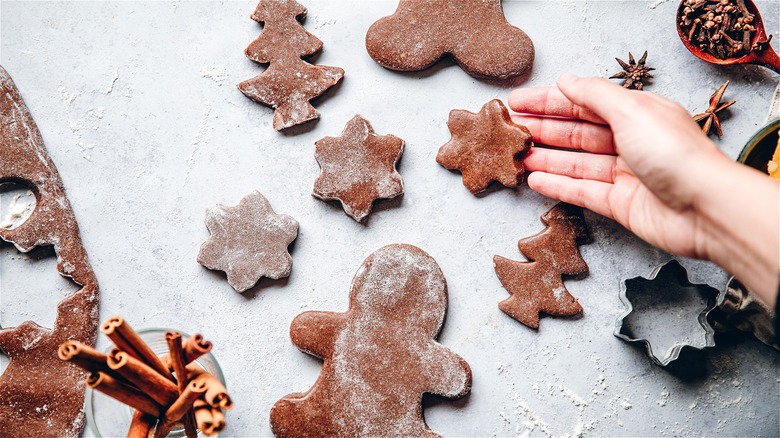 Floured gingerbread cookie cutouts