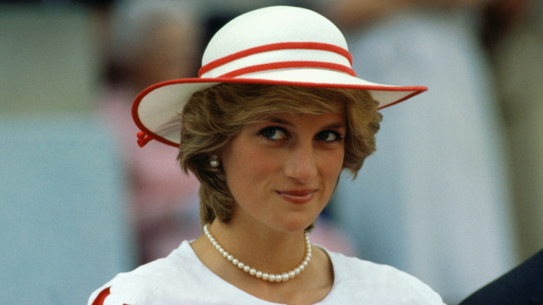 Diana, Princess of Wales, smiling in white hat