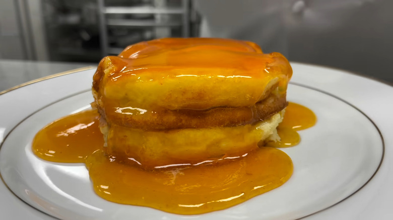 A plate of crêpes soufflé d'abricots, with freshly poured apricot jam