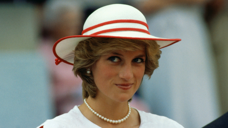 Princess Diana wearing a wide-brimmed hat