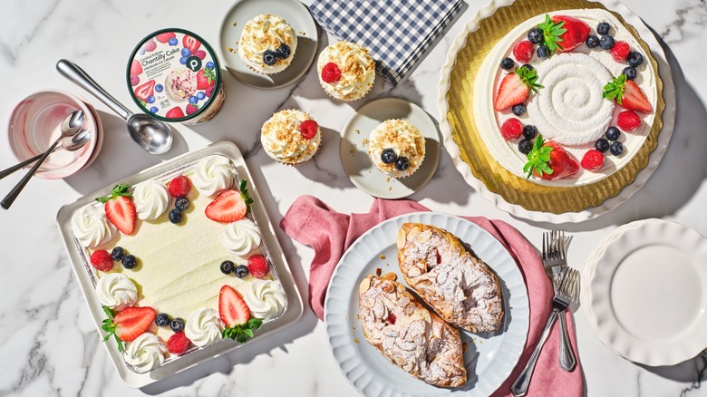 Top-down view of Publix' new Chantilly products: ice cream, cupcakes, croissants, tres leches, and the traditional cake